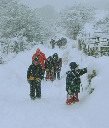 Kids in snowy landscape AHOEC outdoor education